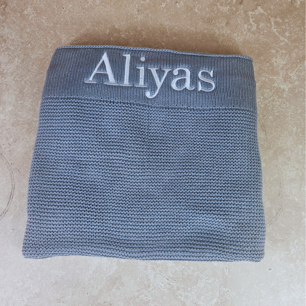 personalised Knitted Grey   Baby Blanket  for your little one to keep them cosy and warm